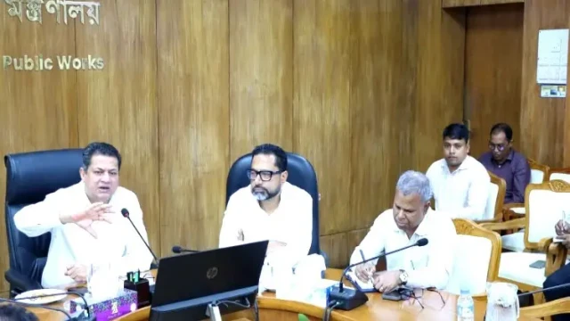 আইনের বাইরে ভবন নির্মাণের সুযোগ নেই: গৃহায়ন মন্ত্রী